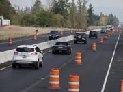 Construction crews are in the process of installing about 20,000 feet of median barrier along state Highway 502 between Interstate 5 and Battle Ground.