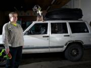 Clark County search and rescue volunteer Victoria Armstrong and her search dog Relic pose for a portrait.