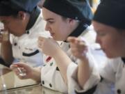 Eight culinary students take part in a tasting of pumpkin spice lattes from several local coffee shops at the Clark County Skills Center in Vancouver.