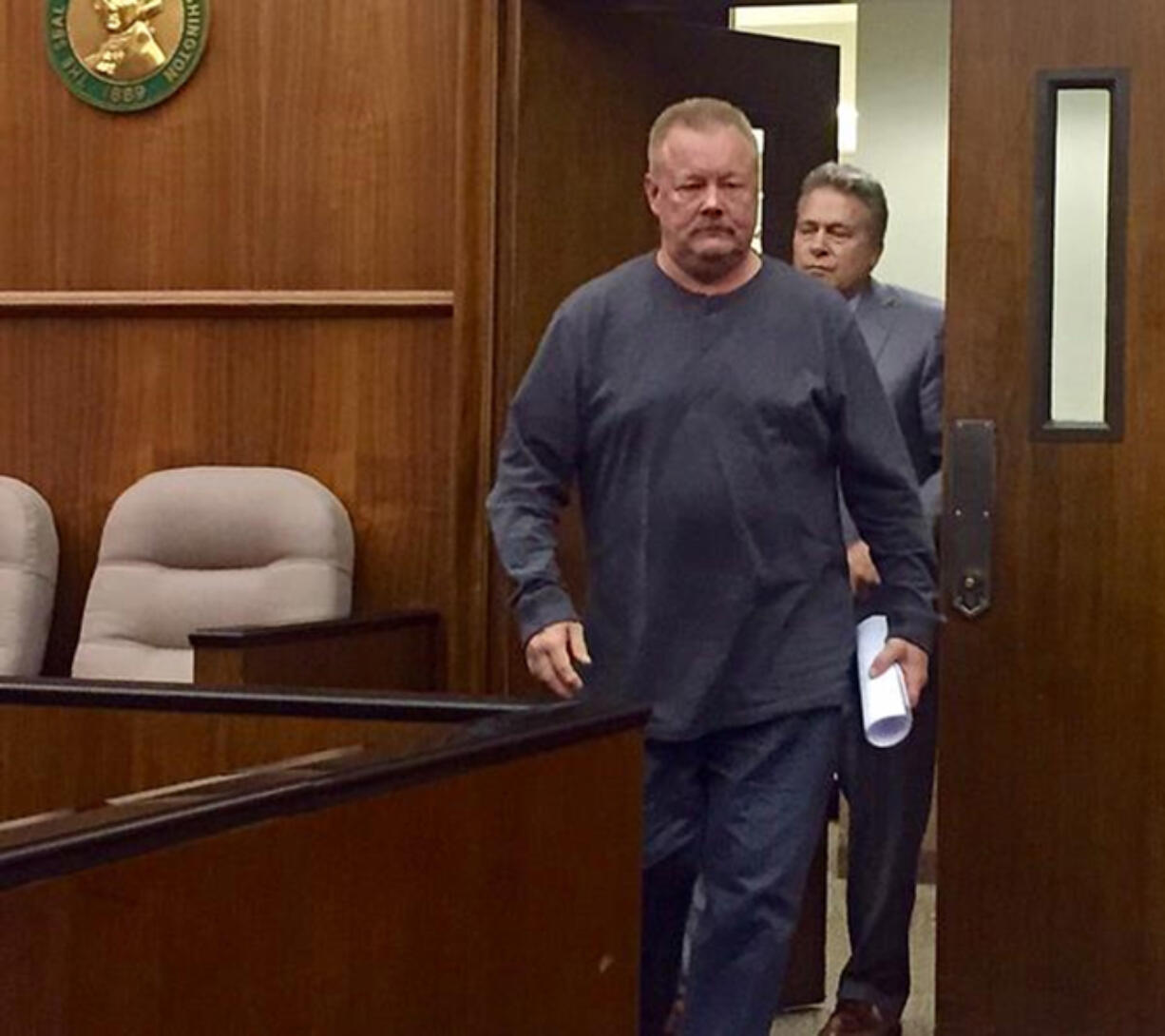 Former Camas High School custodian and assistant softball coach Robbyn D. Mattson arrives Thursday in Clark County Superior Court, where he pleaded guilty to 10 counts of second-degree sexual misconduct with a minor.