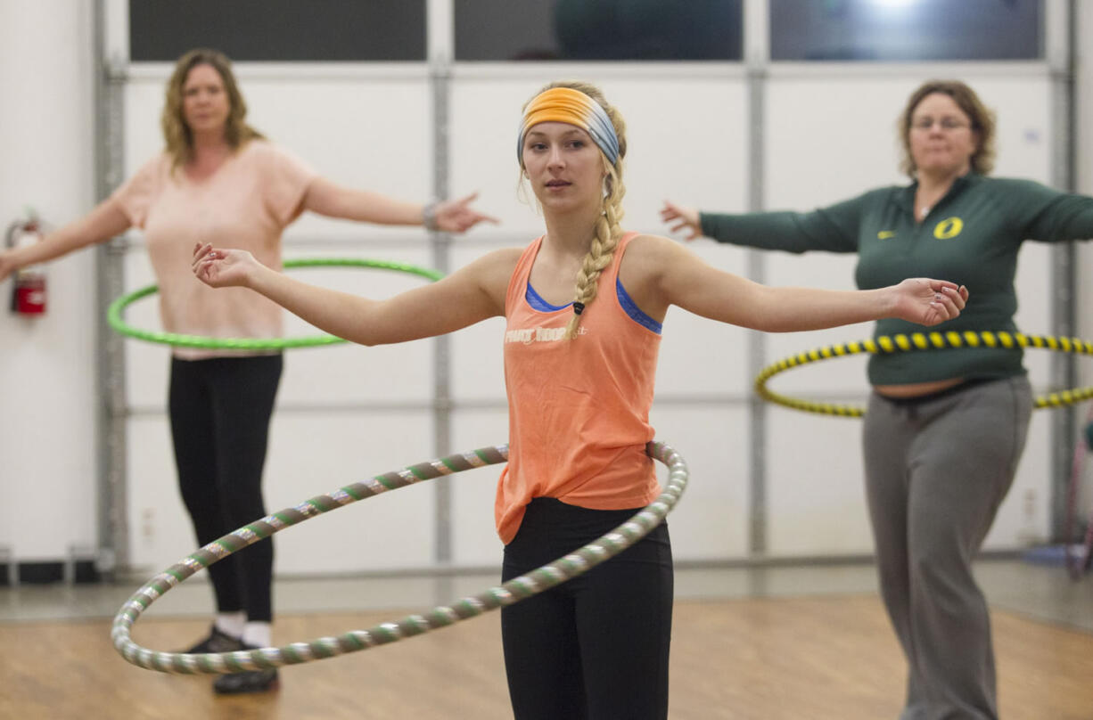 Julia Bradford, 15, attends a Phat Hoops Fit class Wednesday at MyFit Nation in Vancouver.