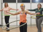 Julia Bradford, 15, attends a Phat Hoops Fit class Wednesday at MyFit Nation in Vancouver.