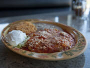 A plate of huevos rancheros is paired with rice and beans at Taqueria El Antojo in Vancouver on Sept. 28. The restaurant recently opened on East Fourth Plain Boulevard.