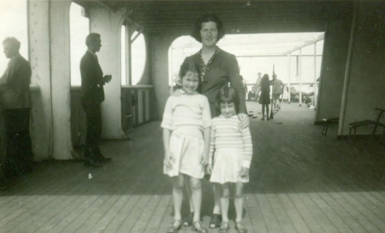 Eight-year-old Nan and 4-year-old Dorothy with their mother, aboard the RMS Aquitania.