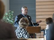 Clark College President Bob Knight speaks to people Thursday about the $2.6 million in proposed cuts to academic programs during a meeting at Gaiser Hall.