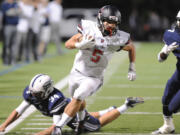 Jared Bentley of Camas runs versus Skyview  at Kiggins Bowl Friday.