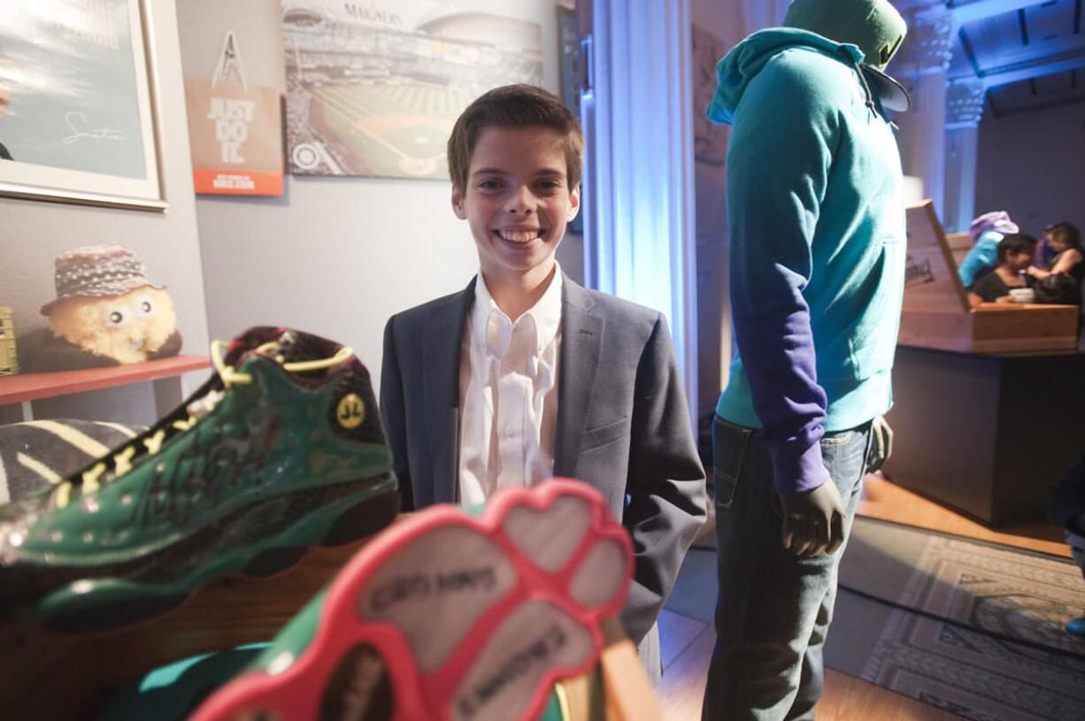 John Charles of Hockinson, 11, unveiled the Doernbecher Freestyle collection he designed Friday at the Portland Art Museum. The Doernbecher Freestyle program, a partnership between Doernbecher Children&#039;s Hospital and Nike, chooses a handful of kids each year to design collections, to be sold beginning Nov. 21 at nike.com and Nike Portland.