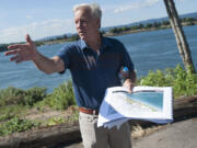 Barry Cain, president of Tualatin-based Gramor Development Inc., talks July 15 about the waterfront development under construction in Vancouver.