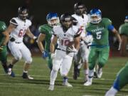 Jordan Del Moral (10) of Camas finds running room against Mountain View at McKenzie Stadium.