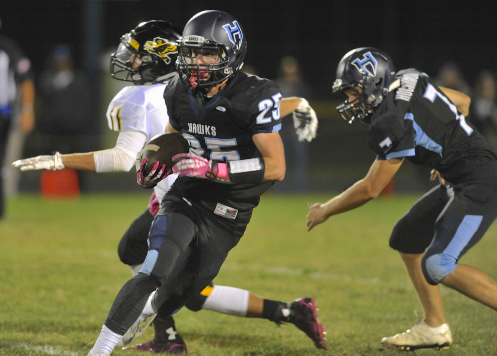 Hockinson's Matt Henry  runs against Hudson's Bay's Carter Morse Friday at Hockinson.