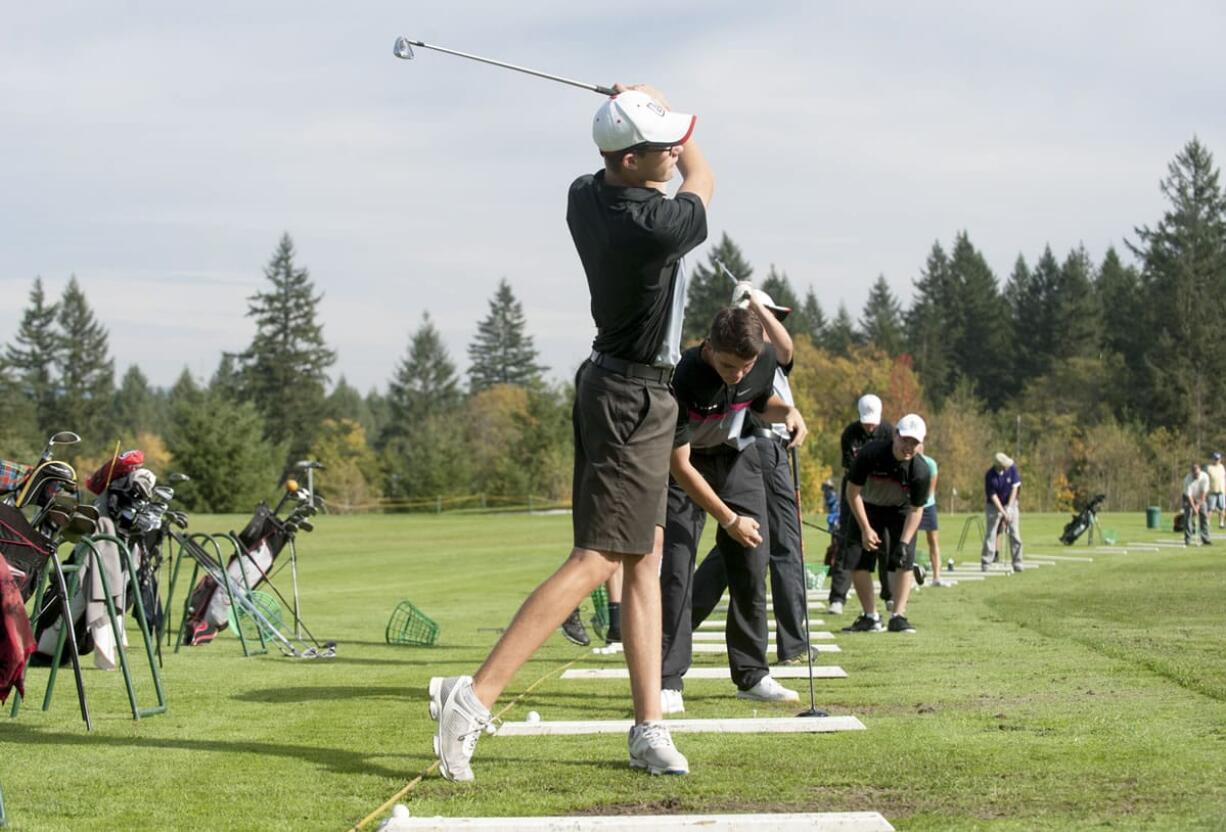 Union golfer Ben Gruher swings a golf club at Camas Meadows Golf Course Thursday October 8, 2015.