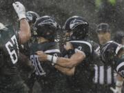 Portland State quarterback Alex Kuresa (right) celebrates touchdown with Trent Riley (left) vs. Montana.