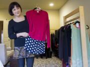 Leslie McMillan, who with her sister created a business called Sew Sisters, uses old clothing to create new apparel, such as this dress, at her home in Vancouver.