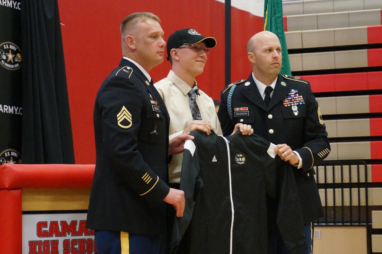 Camas: Camas High School senior Isaac Hodapp, center, was honored at an assembly for making the 2016 U.S.