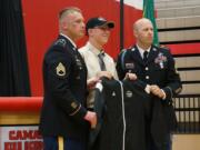 Camas: Camas High School senior Isaac Hodapp, center, was honored at an assembly for making the 2016 U.S.