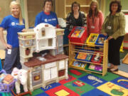 Meadow Homes: H.B. Fuller donated toys and learning materials to Educational Services District 112. From left: H.B.