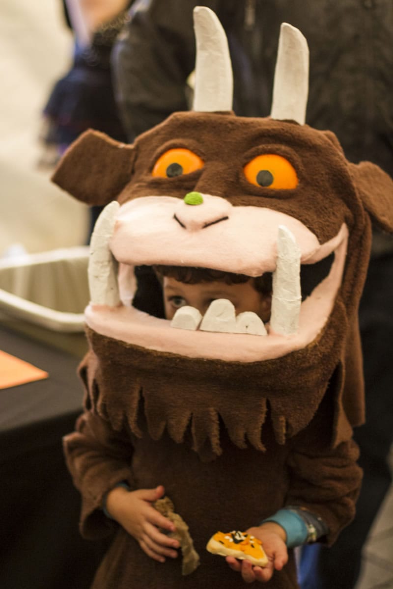 Miles Riley arrives dressed as the Gruffalo at Latte Da&#039;s Halloween costume party Saturday. His father, Mark, made costumes for all four Rileys.