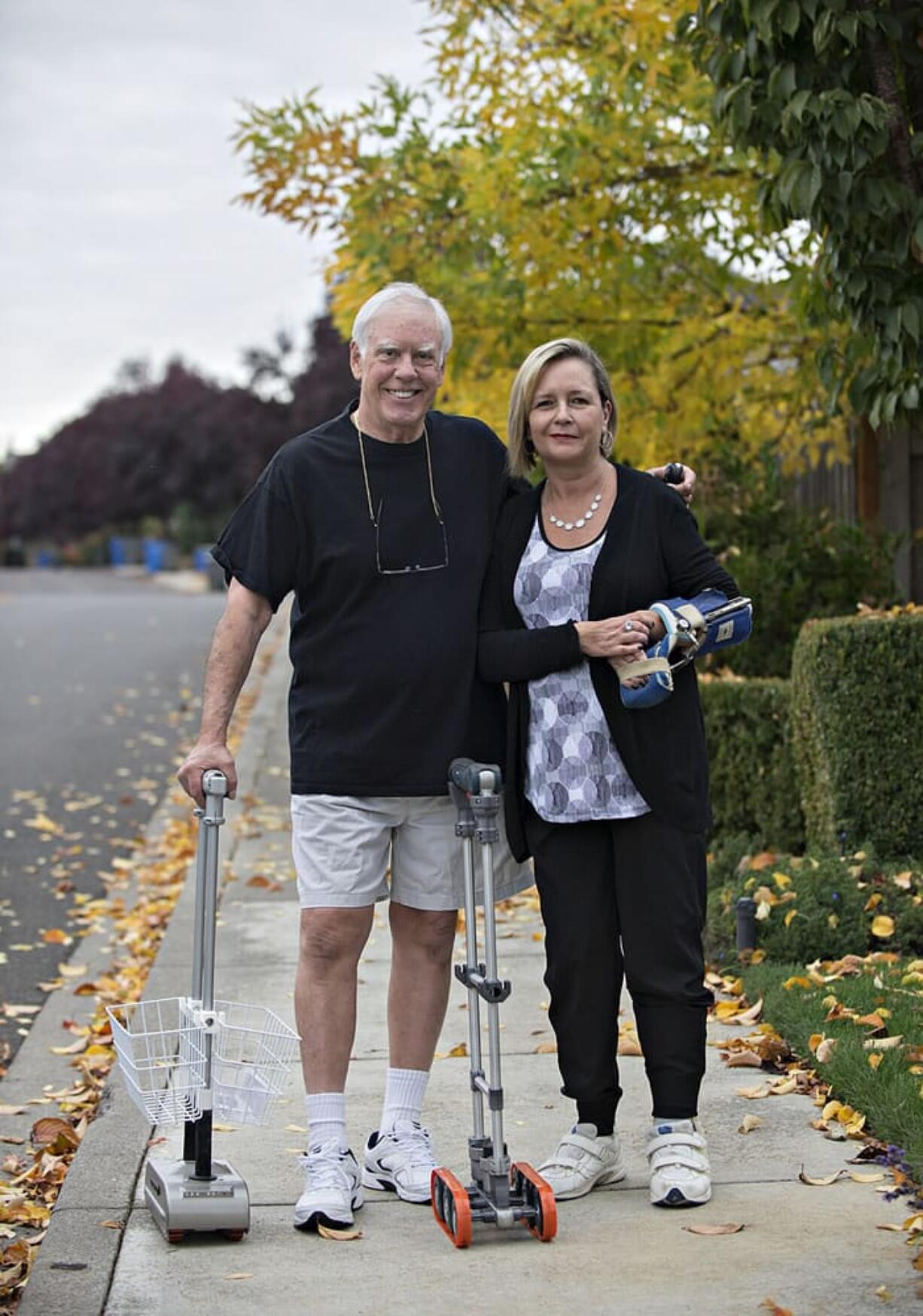 Gregg Teaby, a retired medical device engineer, created a motorized cane for his daughter, Celeste Child, to use after she had a stroke. The cane will make it easier for Child to make her way around the Clark College campus, where she is taking paralegal classes.