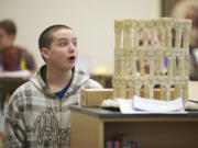 Photos by Steven Lane/The Columbian
Liberty Middle School seventh-grader Brighton Ford looks at a foam model of ancient Roman architecture.