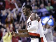 Portland Trail Blazers guard Wesley Matthews celebrates after the Blazers took the lead over the Charlotte Hornets late in the second half of an NBA basketball game in Portland, Ore., Tuesday, Nov. 11, 2014.