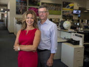 Scott and Jody Campbell are pictured in the newsroom at The Columbian on Tuesday morning, August 25, 2015.