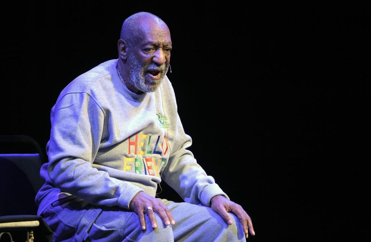 FILE - In this Nov. 21, 2014 file photo, Bill Cosby performs during a show at the Maxwell C. King Center for the Performing Arts in Melbourne, Fla. The scandal-plagued comedaian returns to the stage Wednesday, Jan. 7, 2015 for the first time since November with some planning protests, others vowing not to show up and others still saying they will heckle the comedian in Canada. (AP Photo/Phelan M.