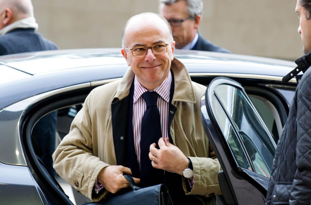 French Interior Minister Bernard Cazeneuve arrives for a meeting of EU justice and interior ministers at the EU Council building in Luxembourg on Thursday. Britain urged the European Union on Thursday to speed the deportation of people who do not qualify for asylum as the EU struggles with its biggest refugee emergency in decades.