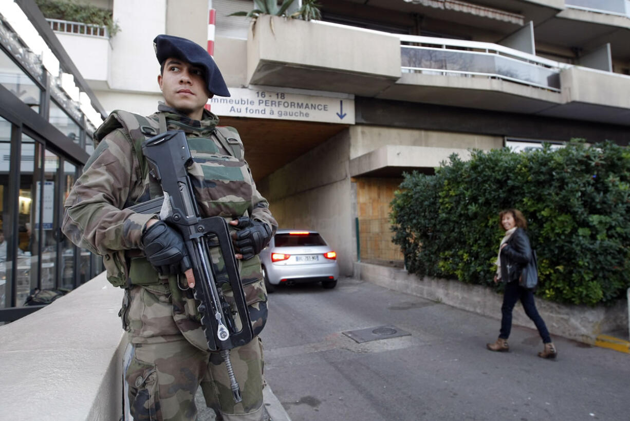 Soldier stands guard outside a synagogue in Marseille, southern France, on Tuesday.