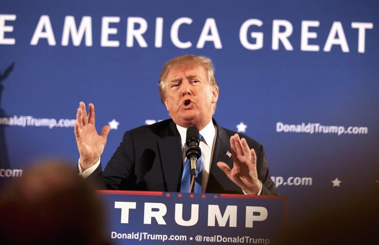 Republican presidential candidate Donald Trump gestures while speaking at a town hall meeting at the Atkinson Country Club in Atkinson, N.H., on Monday.(AP Photo/Cheryl Senter)