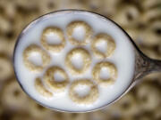 A spoonful of Honey Nut Cheerios (Associated Press files)