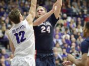 Gonzaga center Przemek Karnowski (24) shoot a basket over Portland center Thomas van der Mars (12) during the first half in Portland, Ore., Saturday, Jan. 3, 2015.