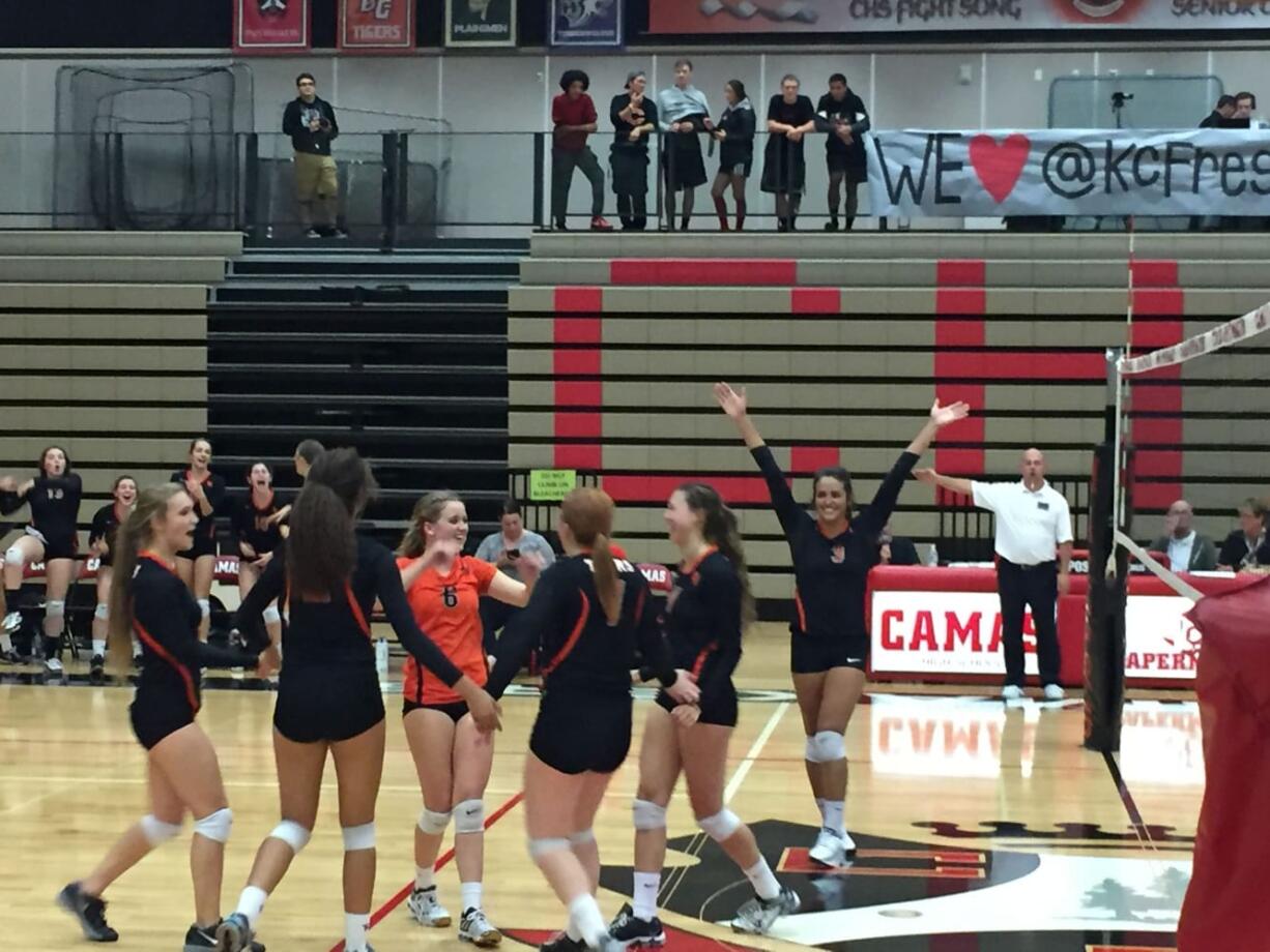 The Battle Ground volleyball team celebrates a point in its match against Camas on Thursday.