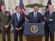 President Barack Obama, accompanied by, from left, Joint Chiefs Chairman Gen. Joseph Dunford, Defense Secretary Ash Carter and Vice President Joe Biden, speaks about Afghanistan on Thursday in the Roosevelt Room of the White House in Washington.