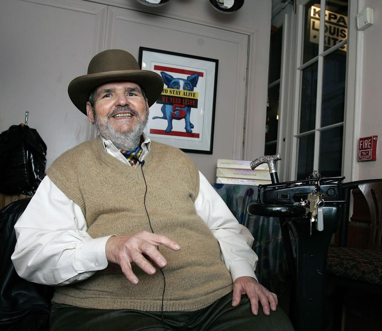 Flowers are placed outside K-Paul&#039;s Louisiana Kitchen on Thursday in the French Quarter of New Orleans. The proprietor, famed chef Paul Prudhomme, died Thursday.