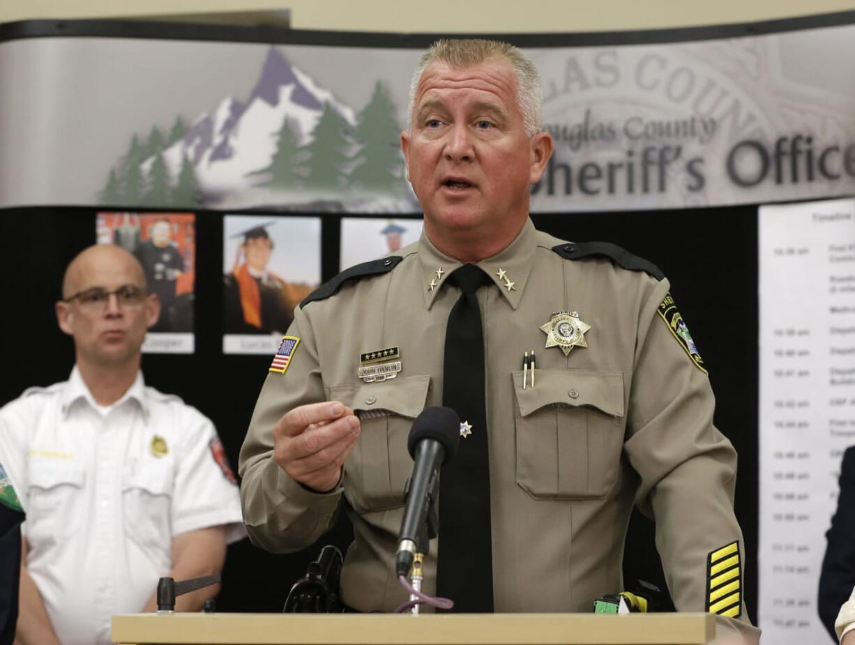 Douglas County Sheriff John Hanlin speaks during a news conference in Roseburg, Ore.