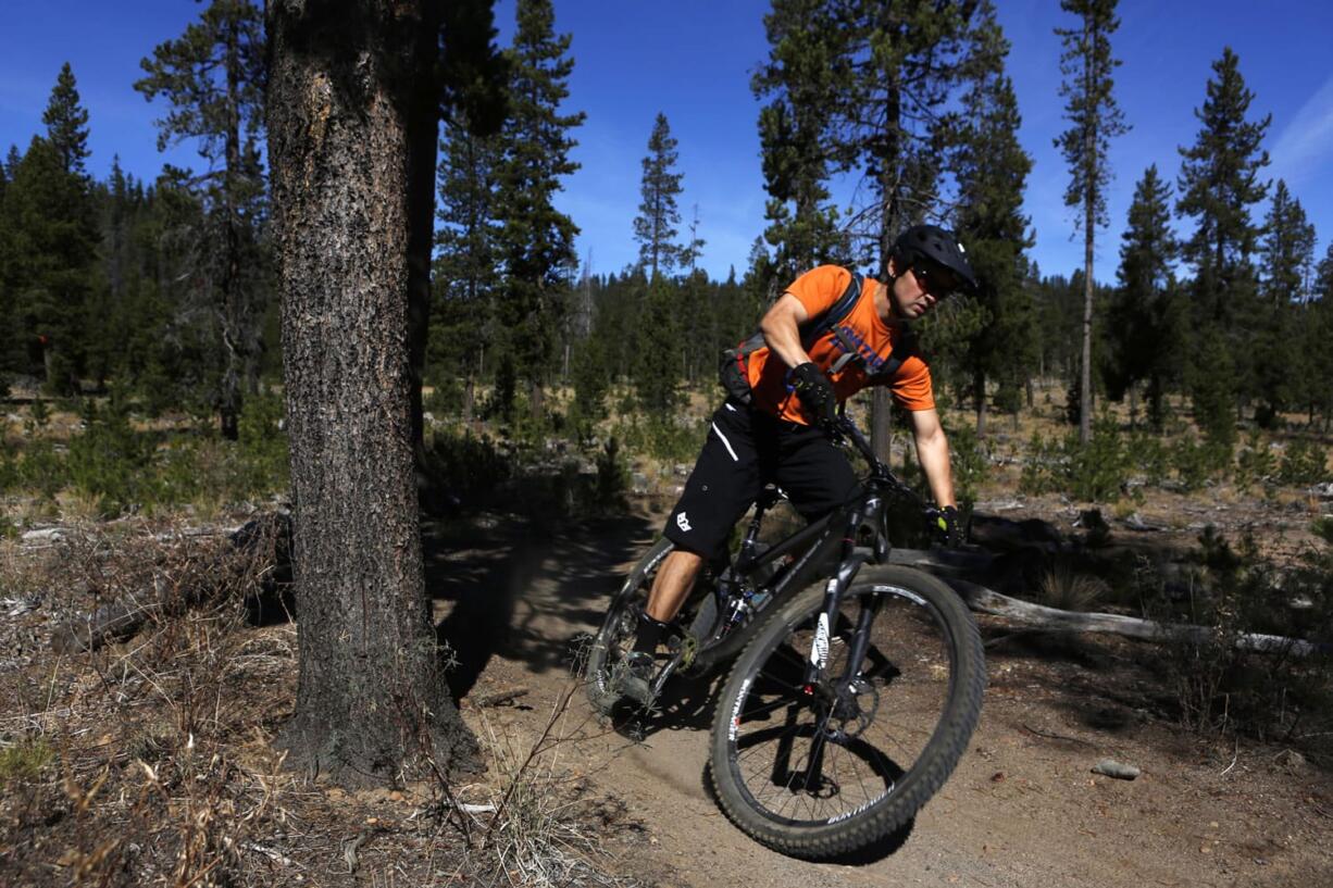 The Tiddlywinks Trail is dry Sept. 19 under Matt Anderson near Wanoga Sno-Park outside Bend, Ore., but rain has fallen since.