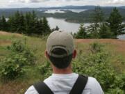 Hikers find water and island views aplenty from trails to the top of Turtleback Mountain, a natural preserve, seen in a June 14, 2007, photo in Washington. On Turtleback Mountain, you can hike in relative solitude.