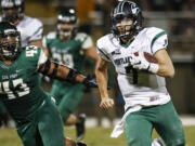 Portland State quarterback Alex Kuresa (7) runs for a touchdown in the first half against Cal Poly during an NCAA college football game Saturday, Oct 24, 2015, in San Luis Obispo, Calif.