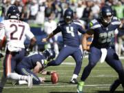 Seattle Seahawks' kicker Steven Hauschka (4) kicks a field goal against the Chicago Bears on Sunday, Sept. 27, 2015, in Seattle.