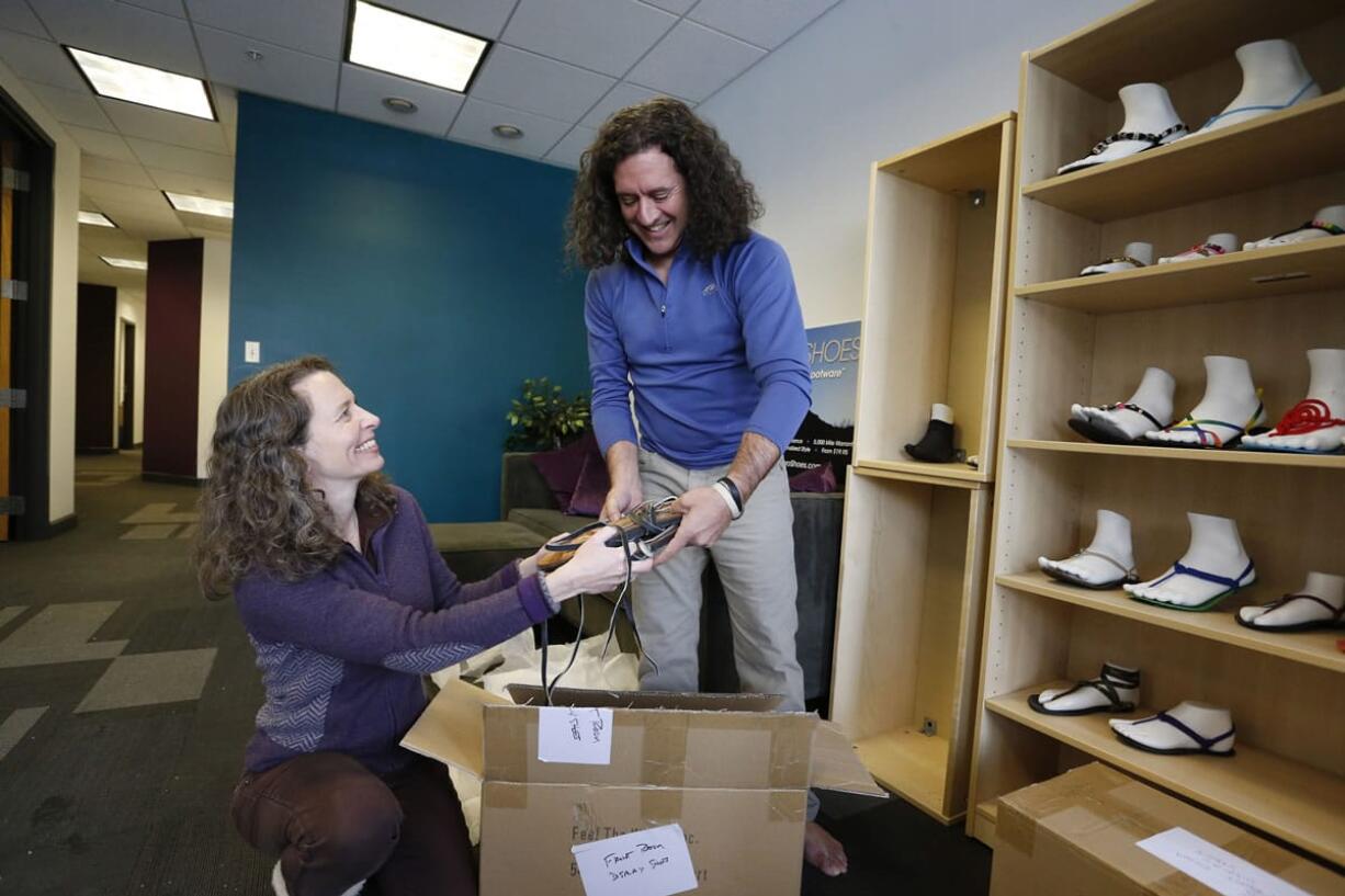 Husband-and-wife team and co-founders of Xero Shoes, Lena Phoenix and Steven Sashen, move into their newer, larger headquarters, in Broomfield, Colo.