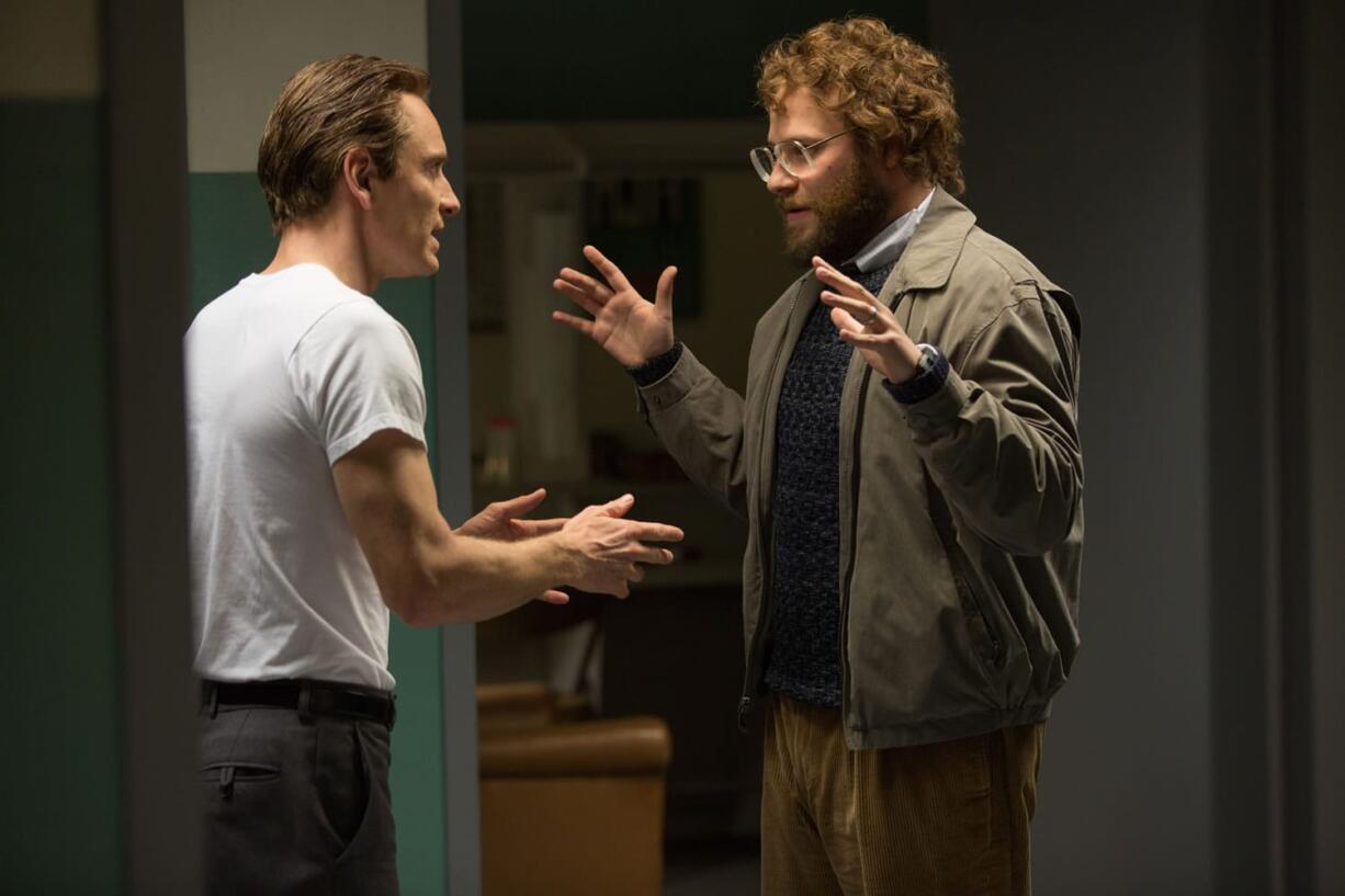 Michael Fassbender, left, stars as Steve Jobs, and Seth Rogen as Steve Wozniak in &quot;Steve Jobs.&quot; (Francois Duhamel/Universal Pictures)