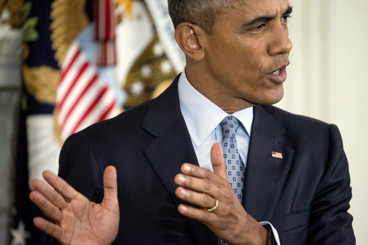 President Barack Obama speaks during a news conference in the State Dining Room of the White House in Washington.