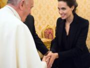 Pope Francis meets Angelina Jolie during a private audience at the Vatican on Thursday.