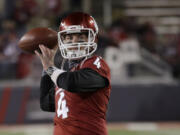 Washington State quarterback Luke Falk leads the Pacific-12 in passing yards and has surprising Washington State (4-2, 2-1) on track for a possible bowl game.(AP Photo/Ted S.