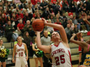 Nikki Corbett nets two of her team-leading 21 points Friday, at Camas High School.