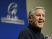 Seattle Seahawks head coach Pete Carroll talks to reporters on Wednesday, Jan. 15, 2014, in Renton, Wash. The Seahawks are to play the San Francisco 49ers on Sunday in the NFL football NFC championship in Seattle. (AP Photo/Ted S.