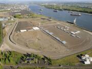 This aerial photograph looks east at the Port of Vancouver's Terminal 5, part of the port's $275 million rail infrastructure investment and the site of a proposed $110 million oil transfer facility.