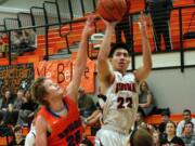 Austin Tran nets two of his 27 points for the Panthers Jan. 28, at Washougal High School.