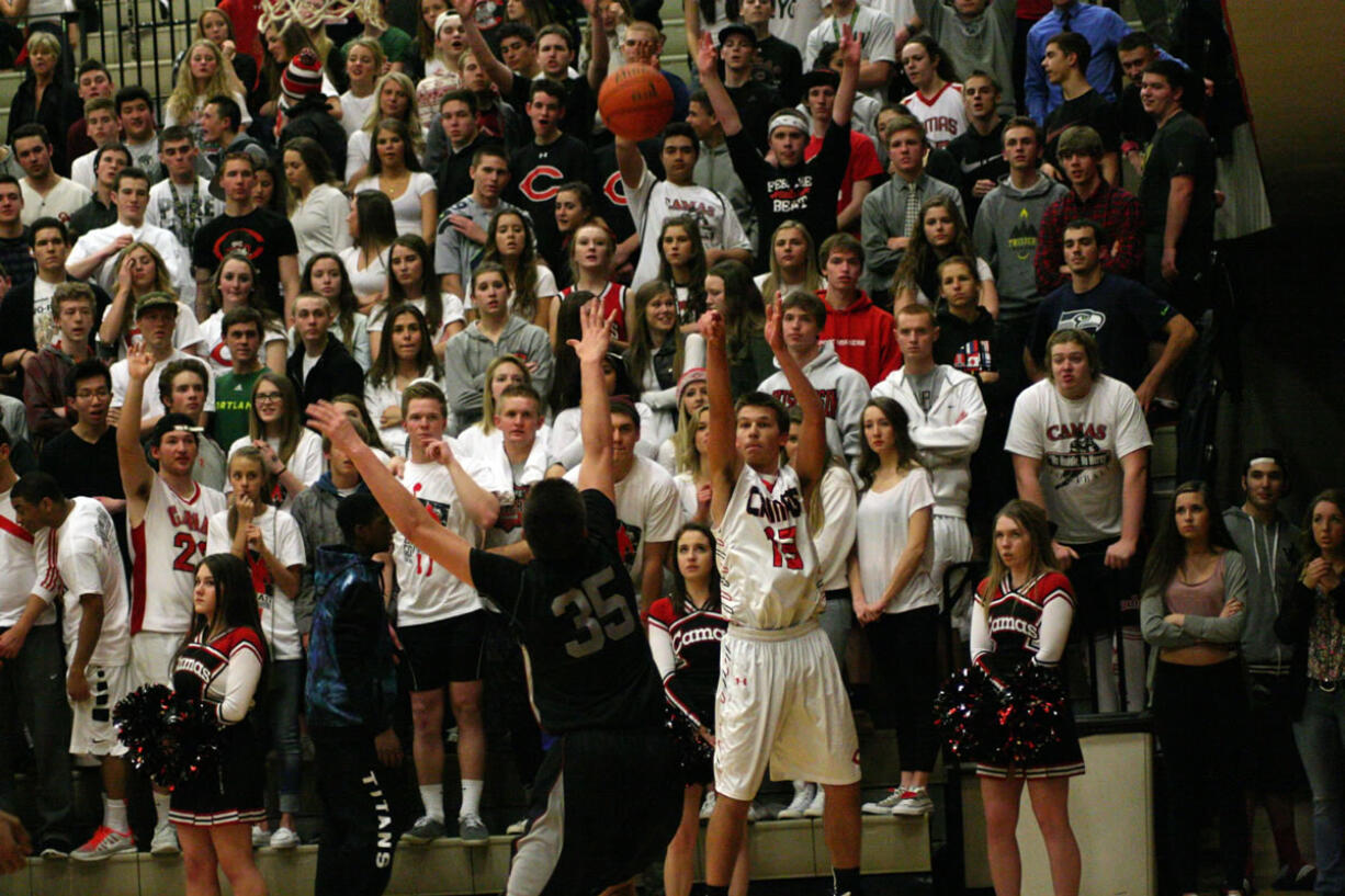 Camas fans cheer on a 3-point attempt by Kantas Zalpys Friday.