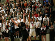 Camas fans cheer on a 3-point attempt by Kantas Zalpys Friday.